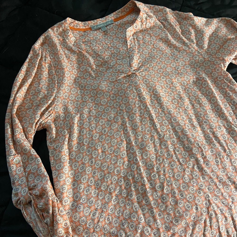 Cute light shirt .. perfect for warmer weather